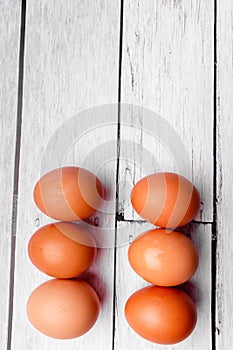 white egg on white wooden table