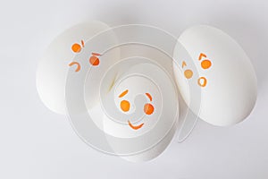 White eggs with different smilies