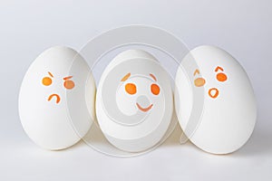 White eggs with different smilies