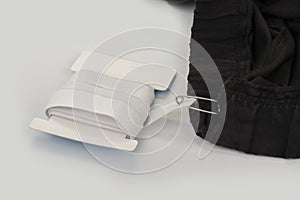 White elastic rubber waistband on a white