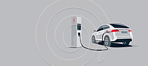 White Electric Car Suv Charging at the Charger Station