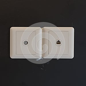 white electric plugs or outlet on wall during construction