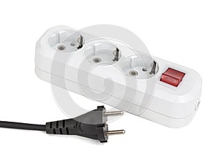 White electric splitter with red switching for for simultaneous switching of several electrical appliances, isolated on white