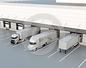 White electric trucks parking in front of modern logistics center