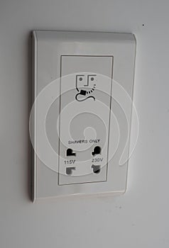 White electrical outlet panel for shavers only