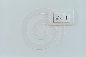 White electrical plug and USB wall outlet