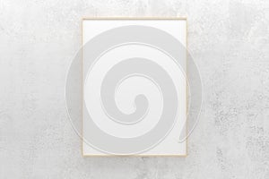 White empty blank picture or poster frame template mock up design hanging on concrete wall background in room with black frame