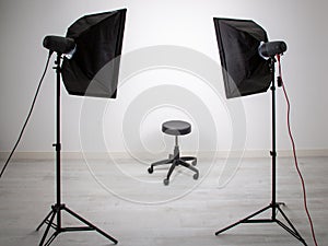 White empty photo studio room light interior for shooting models with professional photographer equipment