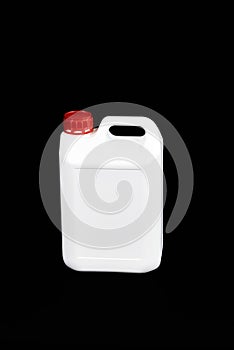 White empty plastic bottle with red cap