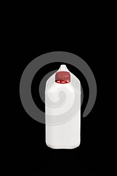 White empty plastic bottle with red cap