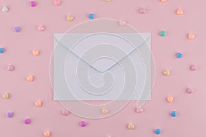 White envelop decorate with pastel heart