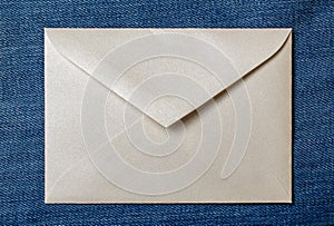 white envelope blank note pinned to a blue notice board