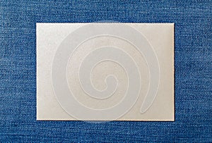 white envelope blank note pinned to a blue notice board