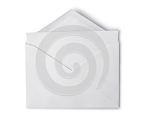 White envelope with folded blank sheet for correspondence