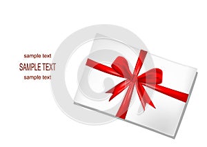 White envelope with red ribbon