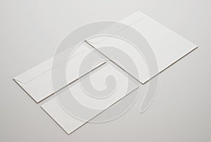 White envelopes on light background