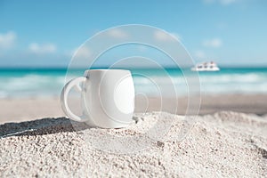 White espresso coffee cup with ocean , beach and seascape