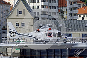 The White Eurocopter of the Super Yacht Katara tied down to its stern Heli Pad