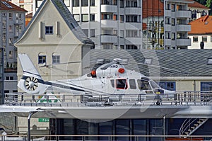 The White Eurocopter of the Super Yacht Katara tied down to its stern Heli Pad photo