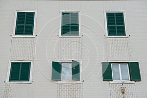white european building with shuttered windows,