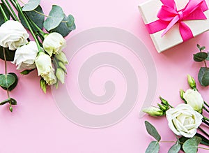 White eustoma flowers and gift box