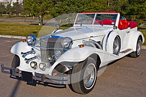 White excalibur car photo