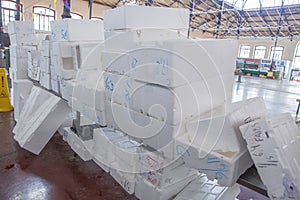 White expanded polystyrene boxes pilled at wholesale market