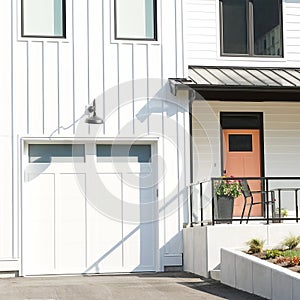 White Exterior Modern Board Batten Style Home House Peach door