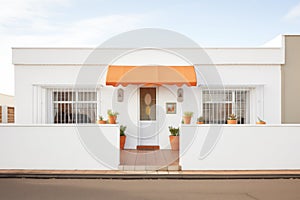 white faade with terracotta accents photo