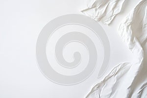 White Fabric Draped on a Smooth Surface