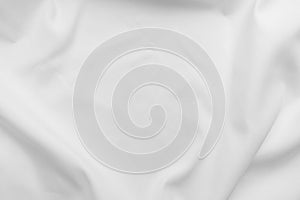 White fabric. luxurious white fabric texture background. Creases of satin, silk, and cotton.