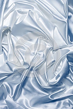 White fabric satin pattern abstract background studio shot