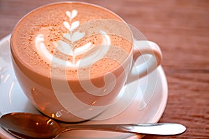 White faience cup with coffee drink cappuccino photo