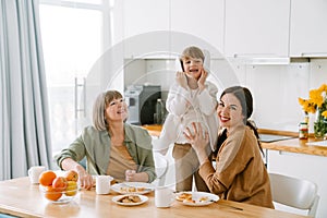 White family making fun having breakfast together