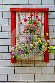 White façade with flower arrangement at Neve Tzedek in Tel Aviv Israel