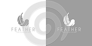 White feather. Black feather. Logo
