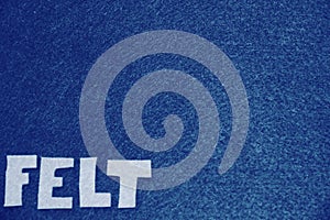 White Felt Letters on Blue Felt Background