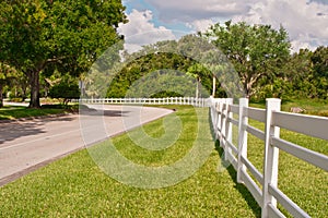 White Fence along a Country Road