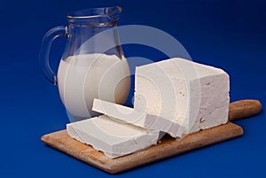 White feta cheese and milk photo