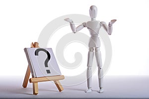 White figure is standing in front of a question mark