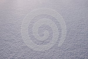 White fine snow surface texture background texture, winter background.