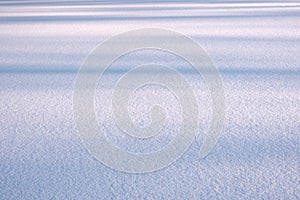 White fine snow surface texture background, winter background