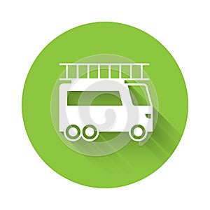 White Fire truck icon isolated with long shadow background. Fire engine. Firefighters emergency vehicle. Green circle
