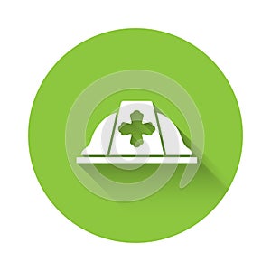 White Firefighter helmet or fireman hat icon isolated with long shadow. Green circle button. Vector