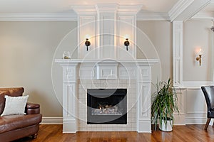 White fireplace in luxury home