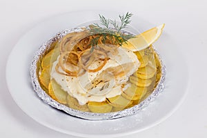 White fish with potatoes, fried onions, dill