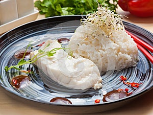 White fish steamed with rice. Asian cuisine. healthy diet