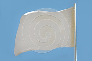 White flag isolated on light blue background