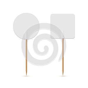 White flags on wooden toothpick. Round and square paper topper for cake or other food isolated on white background