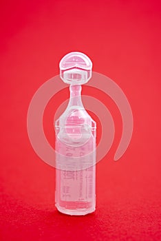 White flask with liquid medicine